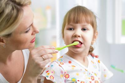 Girl brushing teeth | Dental Fillings Booragoon
