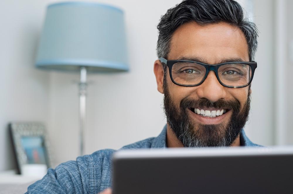 man smiling in office