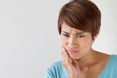 Woman with jaw pain | Extractions Booragoon