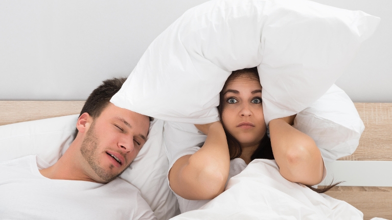 man keeping wife awake with snoring in booragoon