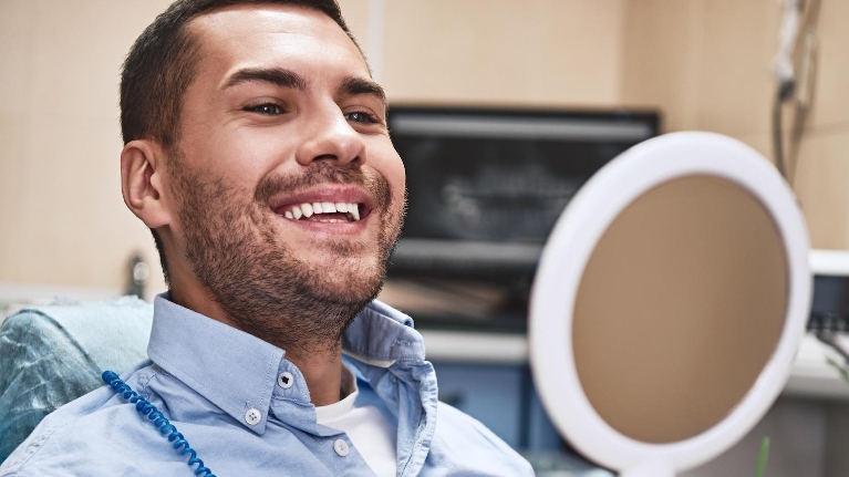 Man getting dental implants in perth