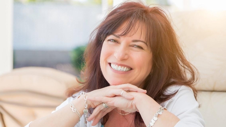 woman with dental implants | Booragoon Dentist